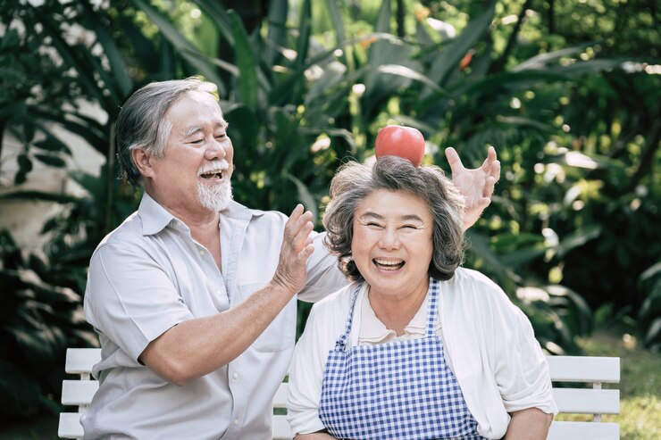 elderly couples cooking healthy